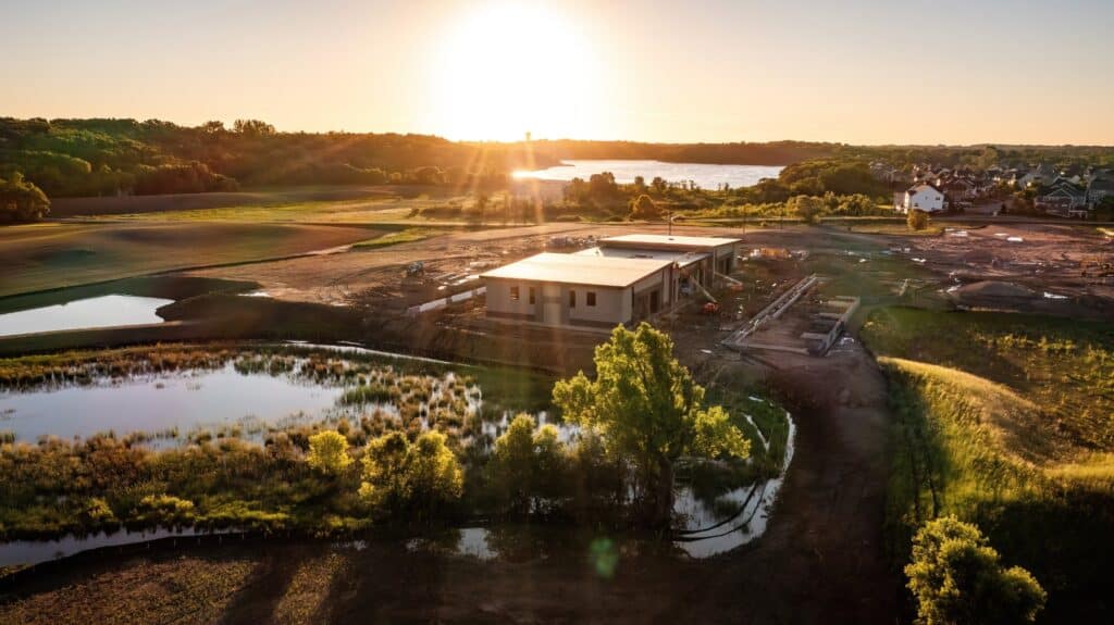 Aerial view of The Hide Out and the adjacent pond and preserve
